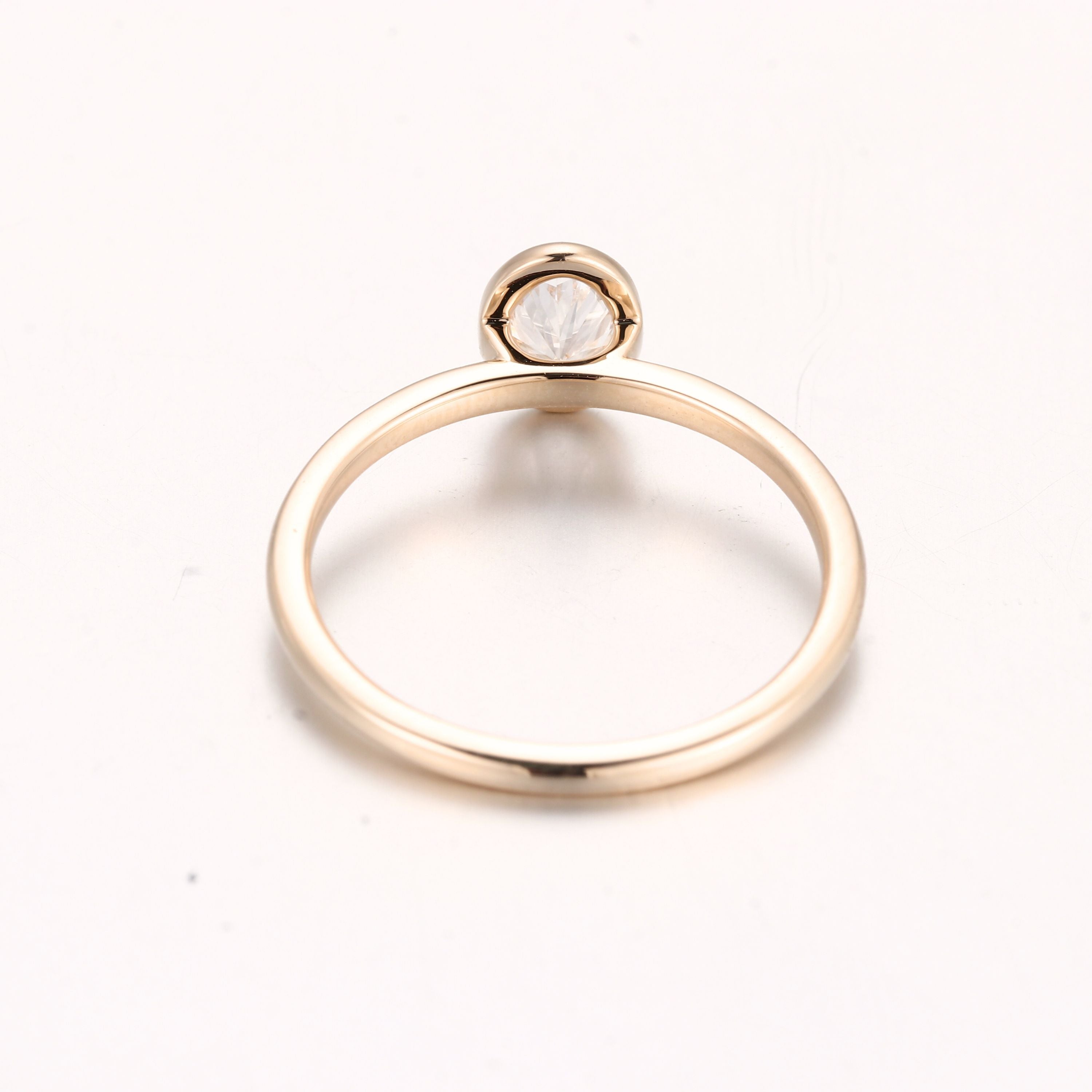 oval diamond gold bezel ring