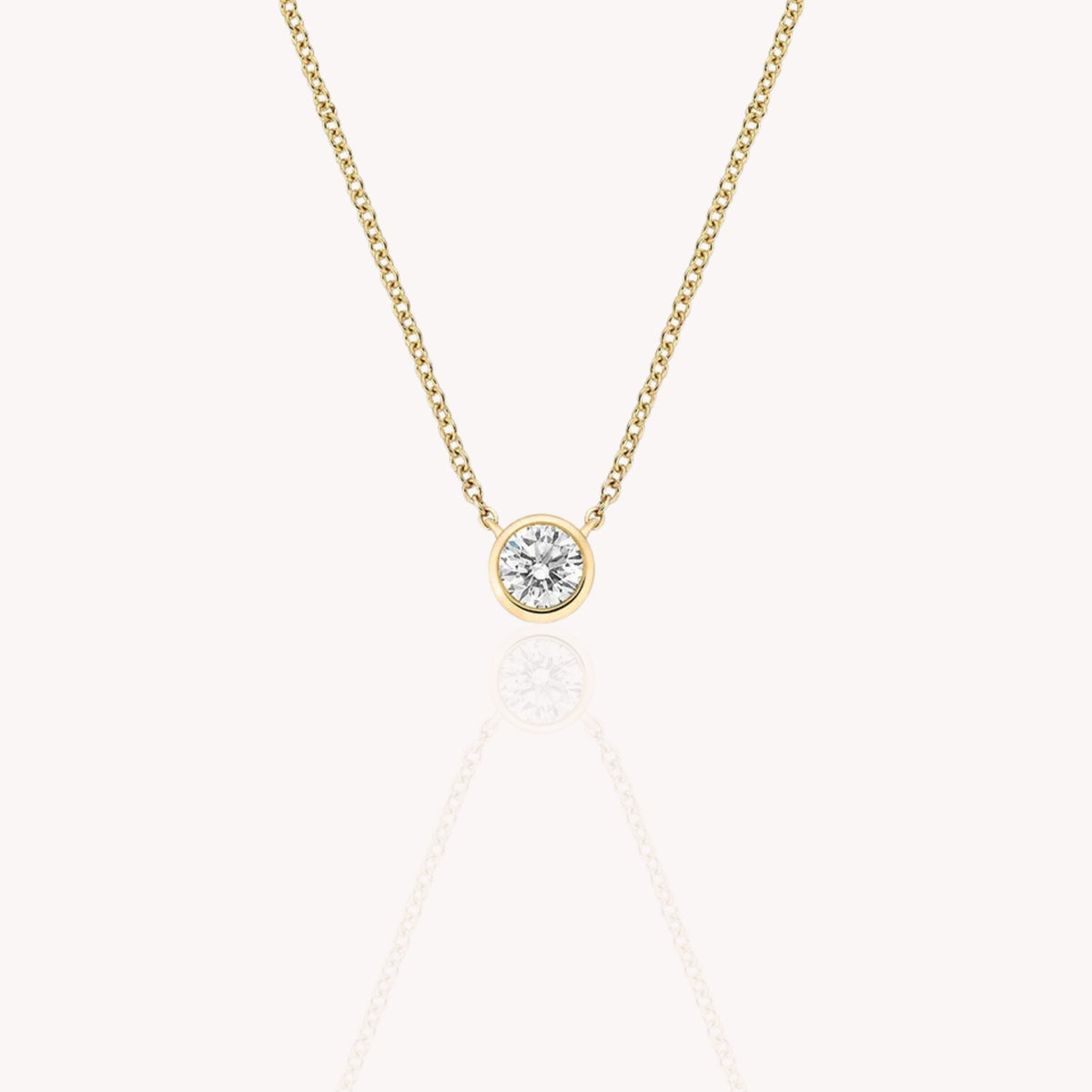 Bezel Solitaire Round Necklace In Yellow Gold  0.3 Carats