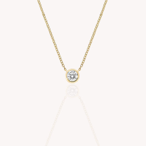 Bezel Solitaire Round Necklace In Yellow Gold  0.3 Carats